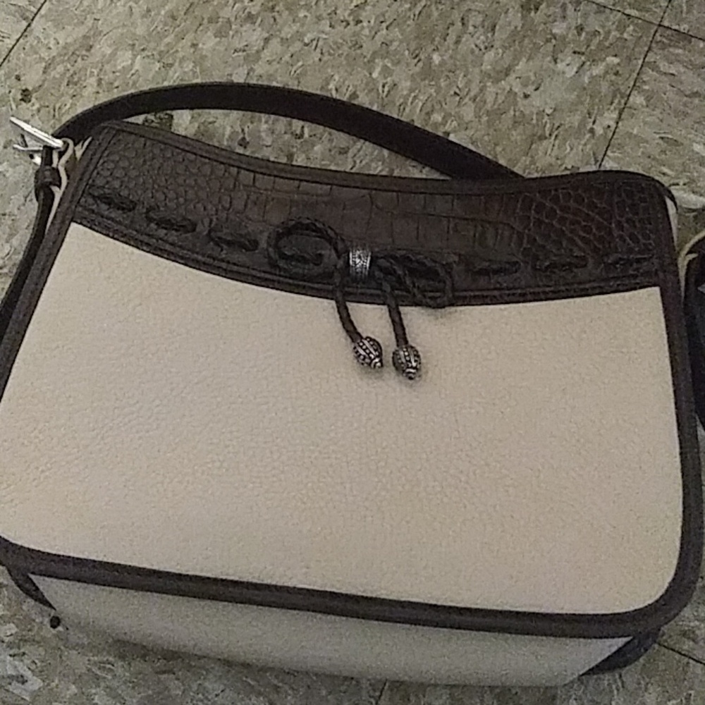 Ladies Brighton purse. Used. Height 8in Length11in Strap 39.5 Inches In Length